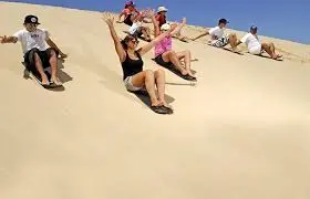 🏂 Optional Sandboarding & Scenic Views